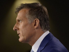 Maxime Bernier announces he will leave the Conservative party during a news conference in Ottawa on August 23, 2018.
