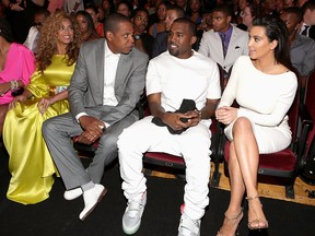 In this July 1, 2012, file photo, (L-R) Beyonce, Jay-Z and Kanye West and Kim Kardashian attend the 2012 BET Awards at The Shrine Auditorium in Los Angeles.