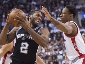 Kawhi Leonard (left) has big shoes to fill in Toronto in replacing DeMar DeRozan.