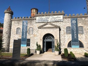 This Friday, Sept. 14, 2018 photo, shows the exterior of the Old Taylor distillery's towering limestone castle which underwent a massive rehabilitation after decades of neglect and was renamed Castle & Key Distillery, in Millville, Ky. Four years after purchasing the property, owners Will Arvin and Wes Murry have poured millions into the project and resumed spirits production. On Wednesday, Sept. 19, the pair reopens the grounds to visitors.