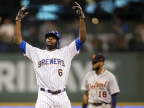 Milwaukee Brewers centre fielder Lorenzo Cain celebrates his double Sunday, Sept. 30, 2018, in Milwaukee. (AP Photo/Darren Hauck)