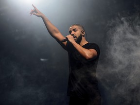 In this June 27, 2015 file photo, Canadian singer Drake performs on the main stage at Wireless festival in Finsbury Park, London. (Photo by Jonathan Short/Invision/AP, File)