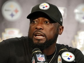 Steelers head coach Mike Tomlin meets with reporters after a game against the Chiefs in Pittsburgh, Sunday, Sept. 16, 2018.