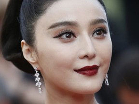 In this May 24, 2017, file photo, Fan Bingbing poses for photographers as she arrives for the screening of the film The Beguiled at the 70th international film festival, Cannes, southern France.