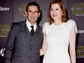Geena Davis (R) and Reza Jarrahy attend the premiere of Walt Disney Pictures and Lucasfilm's "Star Wars: The Force Awakens" at the Dolby Theatre on Dec. 14, 2015 in Hollywood, Calif.