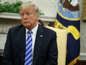 President Donald Trump listens to Emir of Kuwait Sheikh Sabah Al Ahmad Al Sabah during a meeting in the Oval Office of the White House, Wednesday, Sept. 5, 2018, in Washington.