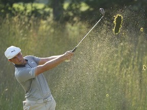 Bryson DeChambeau of the United States plays a shot on the 15th hole during the final round of the Dell Technologies Championship at TPC Boston on Sept. 3, 2018 in Norton, Mass.