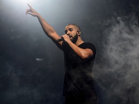 In this June 27, 2015 file photo, Canadian singer Drake performs on the main stage at Wireless festival in Finsbury Park, London. (Photo by Jonathan Short/Invision/AP, File)