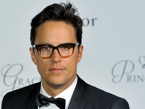 FILE - In this Saturday, Sept. 5, 2015 file photo, U.S. film director Cary Jogi Fukunaga poses on the red carpet as he arrives as he arrives at the Monaco palace to attend the Princess Grace Foundation gala in Monaco. Producers of the James Bond films say Cary Joji Fukunaga will direct the next installment in the spy thriller series, replacing Danny Boyle. Michael G. Wilson, Barbara Broccoli and star Daniel Craig announced Thursday, Sept. 20, 2018 that the movie will start filming at London's Pinewood Studios on March 4, and will be released on Feb. 14, 2020.