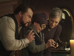This image released by Universal Pictures shows Jack Black, from left, Owen Vaccaro and Cate Blanchett in a scene from "The House With A Clock in Its Walls."