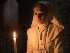 This image released by Warner Bros. Pictures shows Taissa Farmiga in a scene from "The Nun."