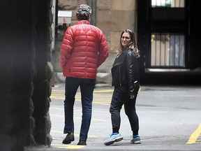 Minister of Foreign Affairs Chrystia Freeland and Gerald Butts, senior political advisor to Prime Minister Justin Trudeau, walk in the loading dock of the Office of the Prime Minister and Privy Council, in Ottawa on Sunday, Sept. 30, 2018. (THE CANADIAN PRESS/Justin Tang)