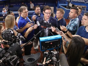 In this file photo, Toronto Blue Jays general manager Ross Atkins the speaks to members of the media before the start of MLB game action against the Detroit Tigers at Rogers Centre on June 29, 2018 in Toronto. (Tom Szczerbowski/Getty Images)