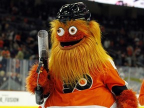 The Flyers mascot, Gritty, takes to the ice during the first intermission of the Flyers' preseason game against the Bruins, Monday, Sept, 24, 2018, in Philadelphia.