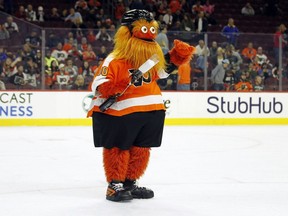 New Flyers mascot, Gritty, takes to the ice during the first intermission of a preseason NHL game against the Bruins, in Philadelphia, Monday, Sept, 24, 2018.