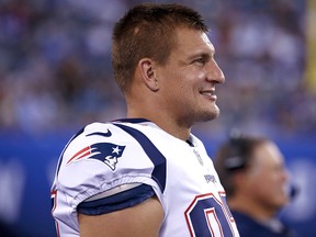 Rob Gronkowski of the New England Patriots stands on the sidelines against the New York Giants during a pre-season game at MetLife Stadium on August 30, 2018 in East Rutherford, New Jersey. (Jeff Zelevansky/Getty Images)