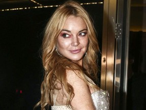 In this Oct. 16, 2016, file photo, actress Lindsay Lohan appears at the opening night of the Lohan Nightclub in Athens, Greece.