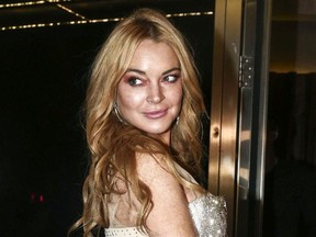 In this Oct. 16, 2016, file photo, actress Lindsay Lohan appears at the opening night of the Lohan Nightclub in Athens, Greece.