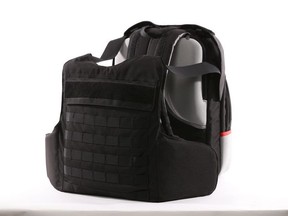 This undated photo provided by the Msada-Armour company, shows a bulletproof backpack. Masada-Armour, an Israeli company, says it has come up with a first-of-its-kind protection gear against the threat of school shootings -- a bulletproof backpack that can transform into a bulletproof vest in less than two seconds by flipping out an armored plate from a concealed compartment. (Masada-Armour via AP) ORG XMIT: DV501