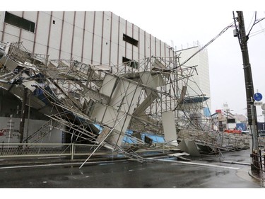 Building scaffolding collapse after a powerful typhoon hit Osaka, western Japan, Tuesday, Sept. 4, 2018.