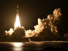 An H-2B rocket carrying the Kounotori 7 cargo spacecraft lifts off from Tanegashima Space Center in the southwestern Japan prefecture of Kagoshima, early Sunday, Sept. 23, 2018.