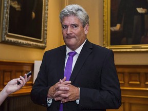 Interim Leader of the Ontario Liberal party John Fraser speaks to media after Ted Arnott was elected the new Speaker of the Ontario Legislative Assembly at Queen's Park, in Toronto on Wednesday, July 11, 2018. (THE CANADIAN PRESS/Christopher Katsarov)