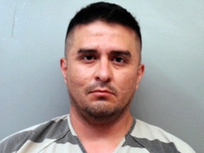 This file photo provided by the Webb County Sheriff's Office shows Juan David Ortiz.