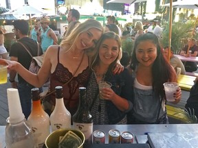 In this Sept. 29, 2017 photo provided by Jessica Ha is Ha, far right, and friends at the Route 91 country music festival in Las Vegas.