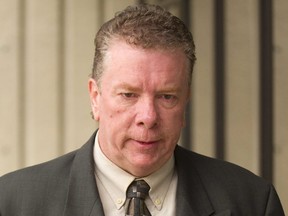 Robert Mugridge walks into the Chatham courthouse on Monday. (Mike Hensen/The London Free Press)