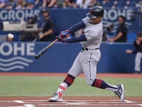 Francisco Lindor #12 of the Cleveland Indians hits a solo home run in the first inning during MLB game action against the Toronto Blue Jays at Rogers Centre on September 6, 2018 in Toronto, Canada. (Photo by Tom Szczerbowski/Getty Images)