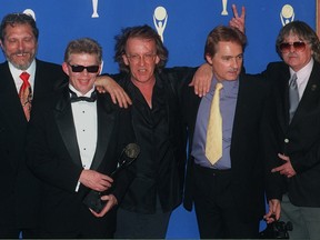 This Jan. 17, 1996, file photo shows members of the 1960's band "The Jefferson Airplane," from left, Jorma Kaukonen, Jack Casady, Paul Kantner, Marty Balin, and Spencer Dryden posing backstage after the band's induction into the Rock and Roll Hall of Fame in New York.