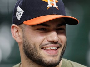 In this Oct. 26, 2017, file photo, Houston Astros starting pitcher Lance McCullers Jr. looks on during a practice for a World Series baseball game, in Houston, Texas.