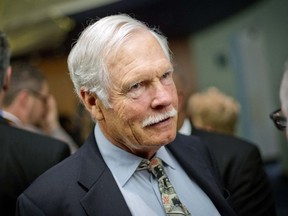 In this Dec. 6, 2013, file photo, media mogul Ted Turner talks with guests at the Captain Planet Foundation benefit gala in Atlanta.