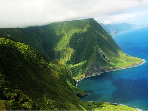 Aerial view of a part of Molokai island coast and Kahiwa falls, Hawaii.