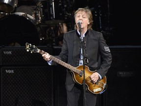 In this July 26, 2017 file photo, Paul McCartney performs on the One on One Tour at the Hollywood Casino Amphitheatre in Tinley Park, Ill.