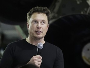 SpaceX founder and chief executive Elon Musk speaks after announcing Japanese billionaire Yusaku Maezawa as the first private passenger on a trip around the moon in Hawthorne, Calif., on Sept. 17, 2018.