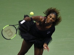Serena Williams, of the United States, serves to Karolina Pliskova, of the Czech Republic, during the quarterfinals of the U.S. Open tennis tournament, Tuesday, Sept. 4, 2018, in New York.