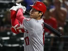 Shohei Ohtani of the Los Angeles Angels hits a homerun against the Texas Rangers at Globe Life Park in Arlington on September 4, 2018. (Ronald Martinez/Getty Images)