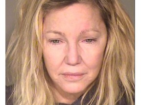 This booking photo released by the Ventura County Sheriff's Office shows actress Heather Locklear who was arrested on suspicion of fighting first responders after a report of a domestic dispute on Sunday, June 24, 2018. (Ventura County Sheriff's Office via AP) ORG XMIT: NYET127