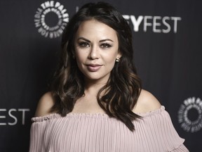 FILE - In this March 25, 2017, file photo, Janel Parrish attends the 34th annual PaleyFest: "Pretty Little Liars" event at the Dolby Theatre in Los Angeles. Parrish and longtime boyfriend Chris Long have gotten married. The wedding took place Saturday, Sept. 8, 2018, in Hawaii, where she was born.