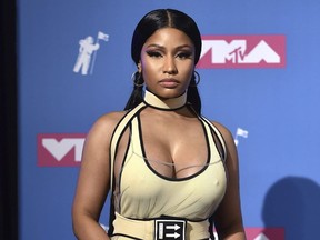 In this Aug. 20, 2018 file photo, Nicki Minaj poses in the press room at the MTV Video Music Awards in New York.