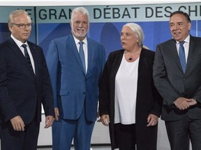 PQ leader Jean-François Lisée, from left, Liberal Leader Philippe Couillard, QS Leader Manon Massé, and CAQ leader François Legault at Thursday night's debate in Montreal.