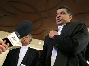 Counsel K.A Ramu,  lawyer for American Gerald Wayne Mickelson, speaks to the media after a court hearing at Kuala Lumpur High Court, in Kuala Lumpur, Malaysia, Tuesday, Sept. 4, 2018.