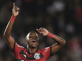 In this file photo dated Wednesday, May 23, 2018, Brazil's Vinicius Junior gestures during a Copa Libertadores soccer match against Argentina's River Plate in Buenos Aires, Argentina.