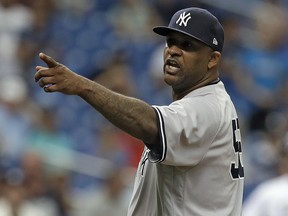 New York Yankees' CC Sabathia points at the Tampa Bay Rays dugout after he was ejected for hitting Jesus Sucre with a pitch Thursday, Sept. 27, 2018, in St. Petersburg, Fla. (AP Photo/Chris O'Meara)