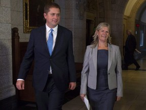 Leader of the Opposition Andrew Scheer walks with Leona Alleslev, who crossed the floor from the Liberal party to Conservative party before Question Period on Parliament Hill in Ottawa, Monday, Sept. 17, 2018.