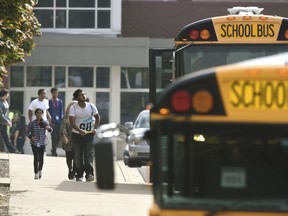 Warren Fitzgerald High School students are released from lockdown after a student was stabbed on campus Wednesday, Sept. 12, 2018, in Warren, Mich.