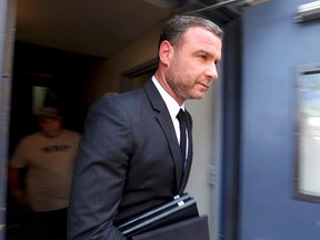 In this Aug. 14, 2018, file photo actor Liev Schreiber leaves court in Nyack, N.Y., after appearing on a harassment charge.