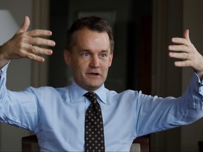 Veteran Affairs Minister Seamus O'Regan gestures during an interview in his office on Parliament Hill in Ottawa on Dec. 6, 2017.