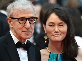 This May 11, 2016, file photo shows director Woody Allen and his wife Soon-Yi Previn as they arrive for the screening of the film "Cafe Society" during the opening ceremony of the 69th Cannes Film Festival in Cannes, France.